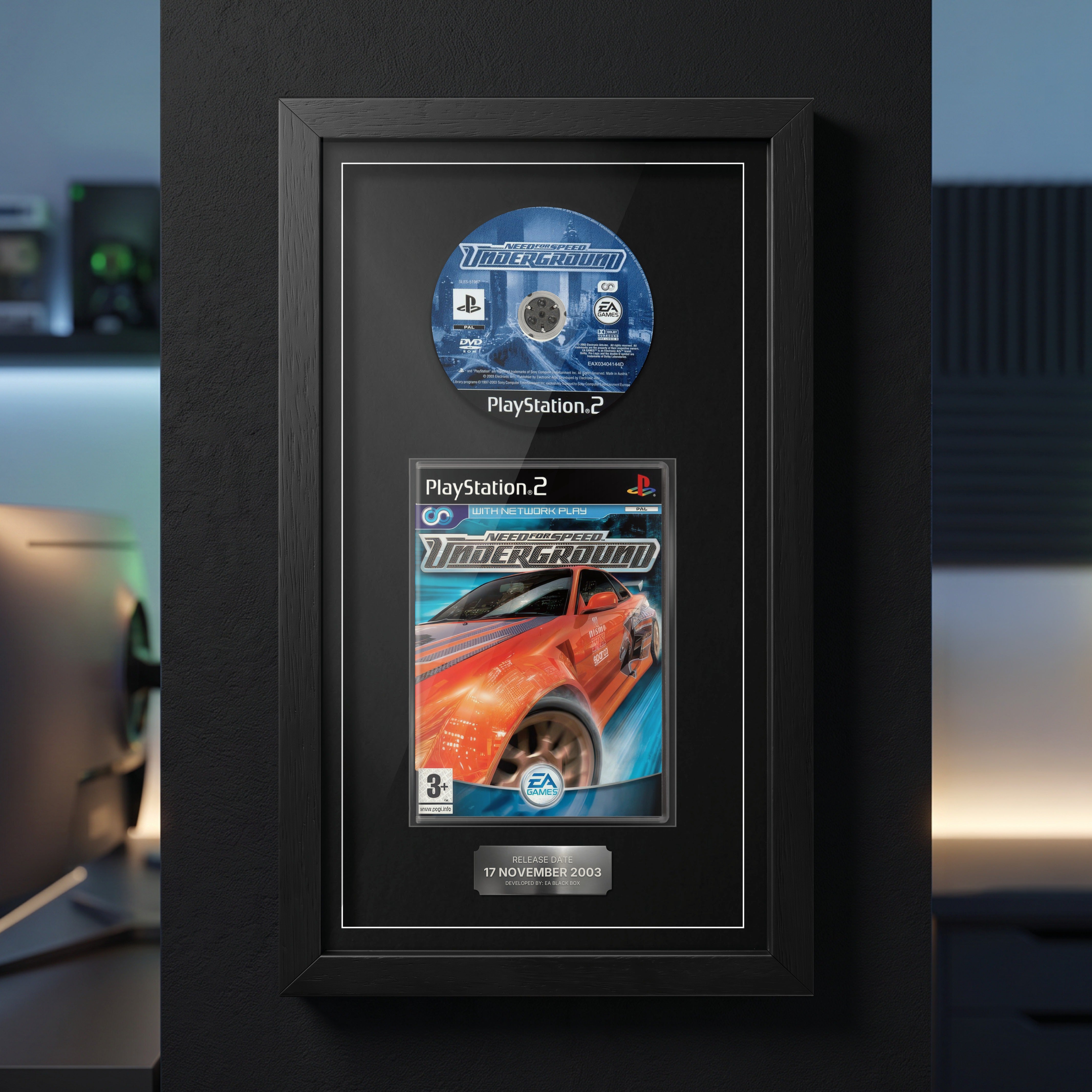 Need For Speed: Underground PS2 Exhibition Range frame on a dark wall with the disc and case on display