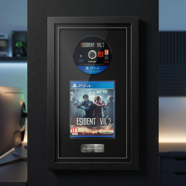 Resident Evil 2 PS4 Exhibition Range frame on a dark wall with the disc and case on display